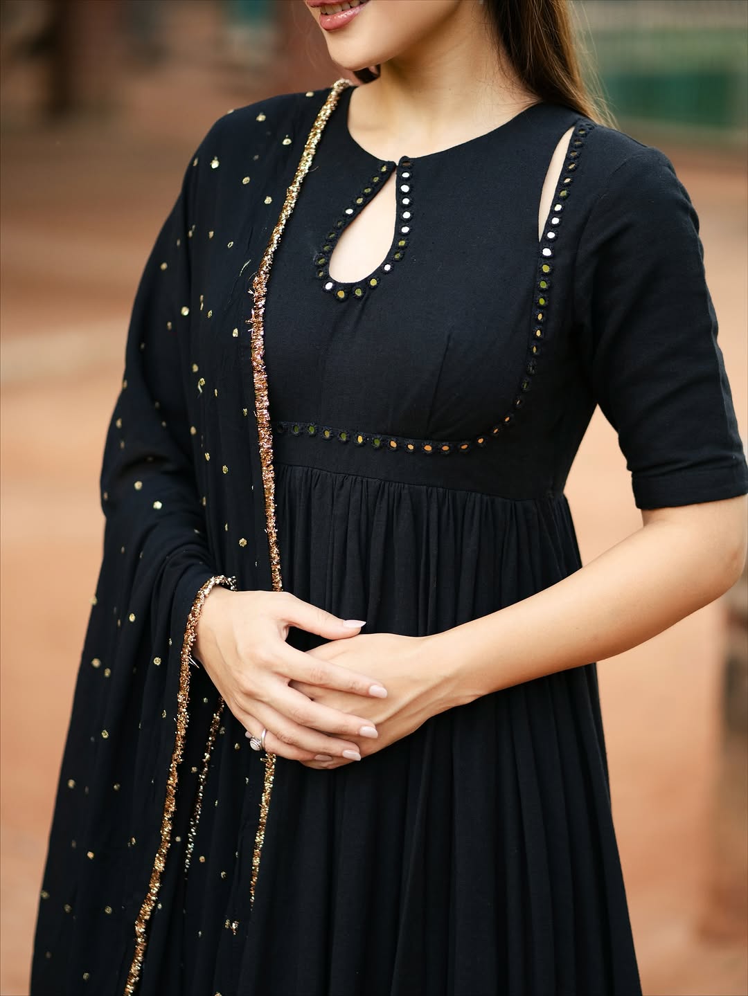black Anarkali suit set with a dupatta