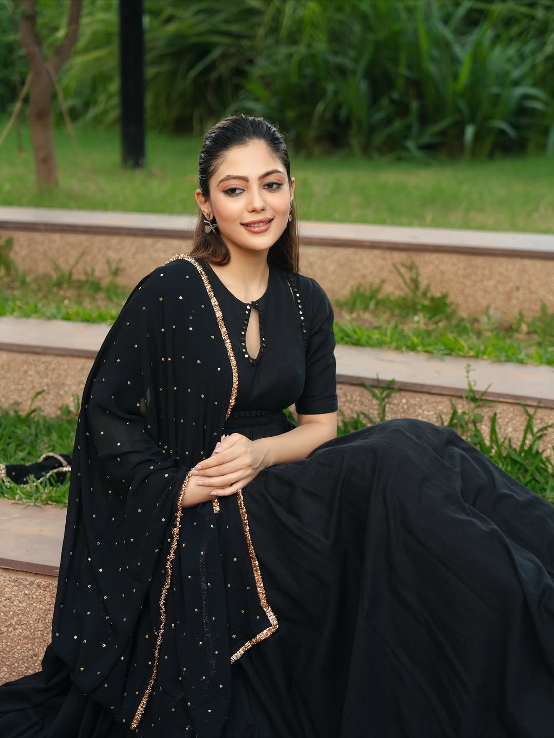 black Anarkali suit set with a dupatta