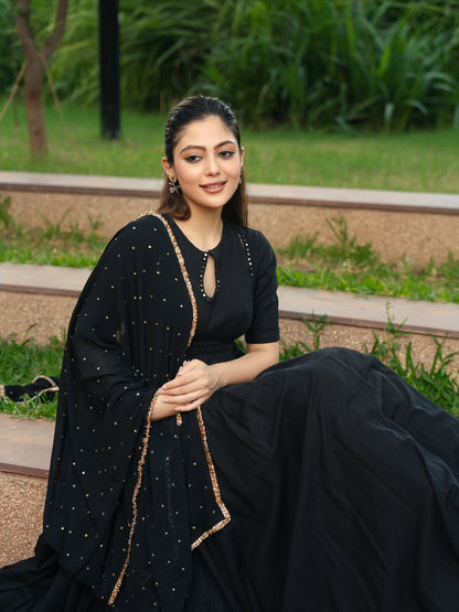 black Anarkali suit set with a dupatta