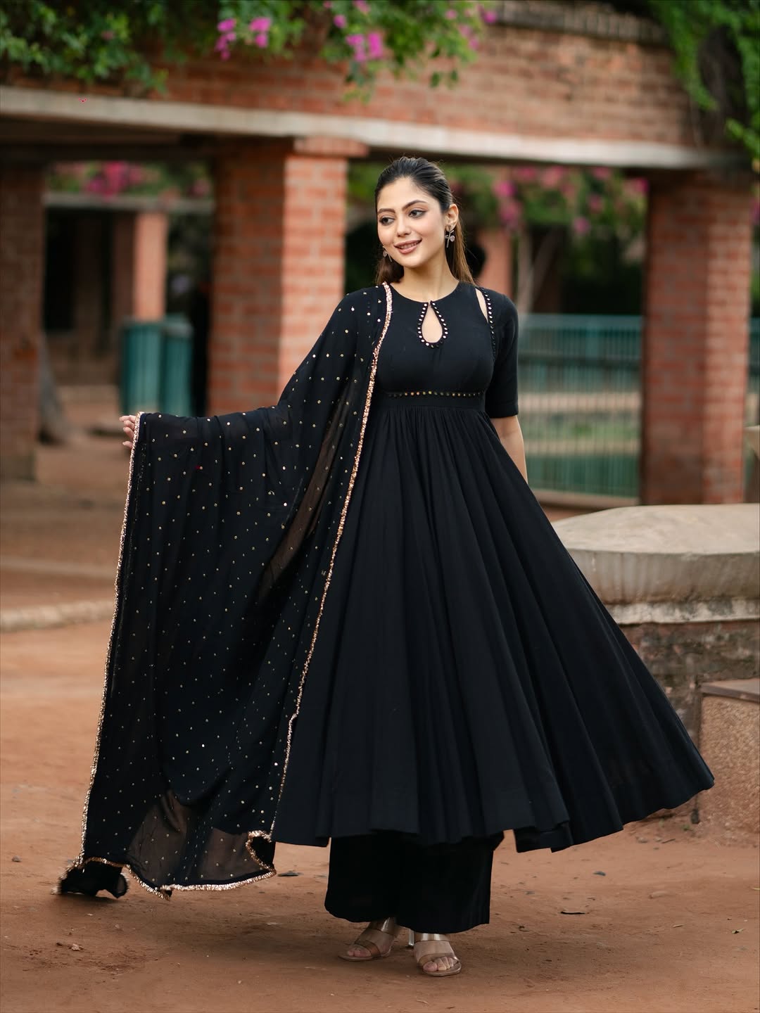 black Anarkali suit set with a dupatta