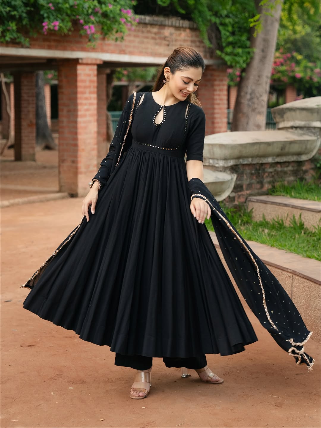 black Anarkali suit set with a dupatta