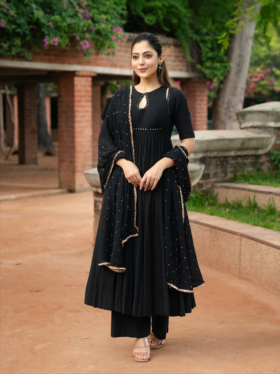 black Anarkali suit set with a dupatta